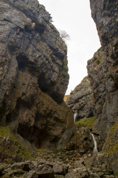 istock Waterfall rock Malham Cove Yorkshire Dales England 1182955258