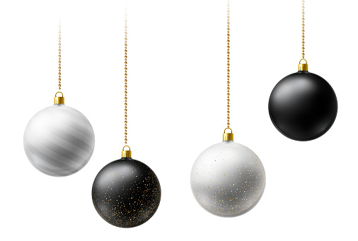 Realistic black and white  Christmas balls hanging on gold beads chains on white  background.  New Year background.