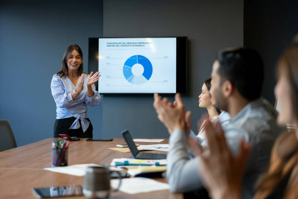 istock Team at a successful business presentation at the office 1182958383