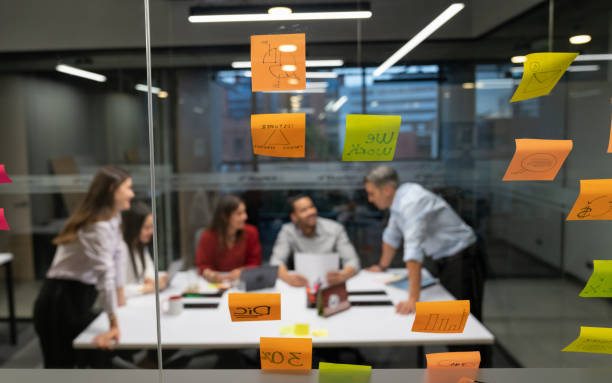 istock Adhesive notes on glass at the office 1182960513