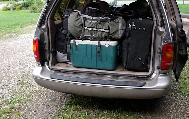 istock Open boot of a car filled with camping gear 118296120