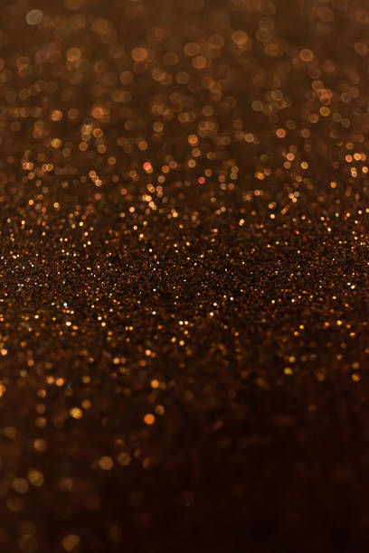 istock Abstract glitter shining lights background. De-focused lights 1182963030