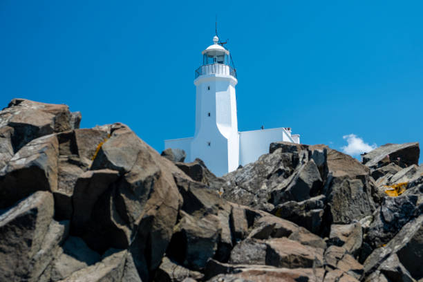istock Lighthouse near the sea 1182964516