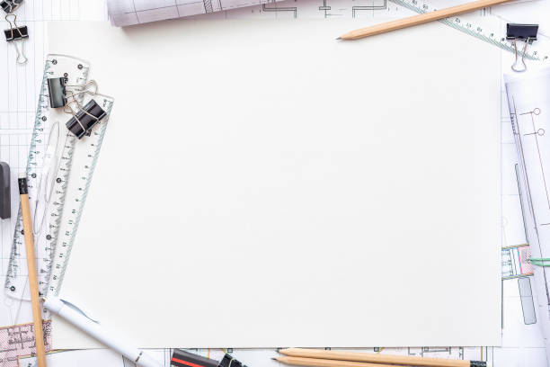 istock Architectural plans, pencil and ruler on the table. Place for your text 1182964838