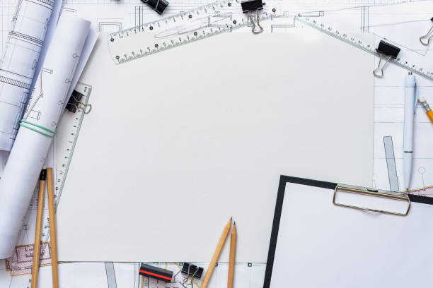 istock Architectural plans, pencil and ruler on the table. Place for your text 1182965448