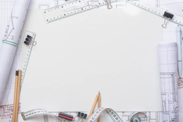 istock Architectural plans, pencil and ruler on the table. Place for your text 1182965495