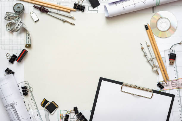 istock Architectural plans, pencil and ruler on the table. Place for your text 1182965585