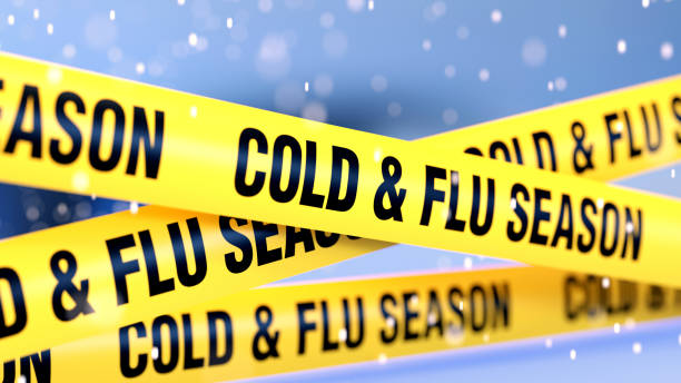 Cold and Flu Quarantine Tape Barrier over Snowy Defocused Background Yellow cold and flu quarantine barrier over snowy defocused background.  Horizontal composition with copy space. Cold and flu quarantine concept. season stock pictures, royalty-free photos & images