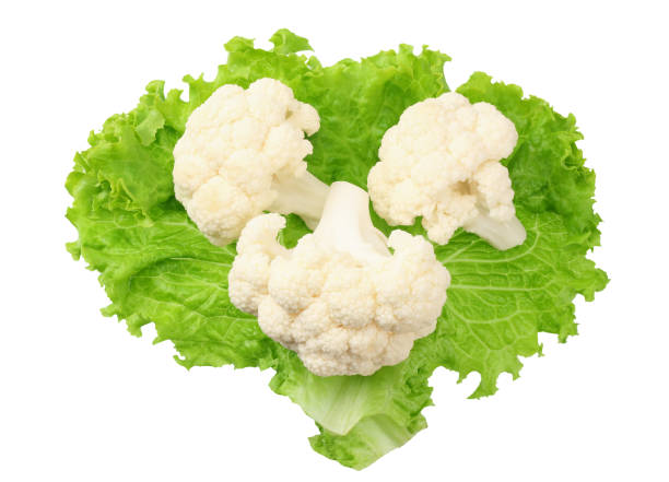 istock Cauliflower on a lettuce leaf isolated on a white background. top view 1182968742