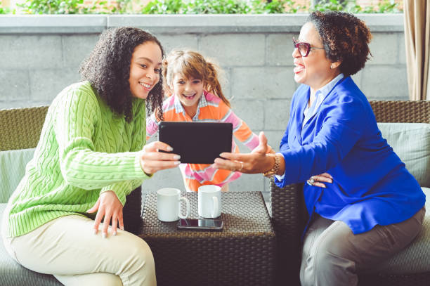istock Family uses a tablet to communicate, three generations 1182970027
