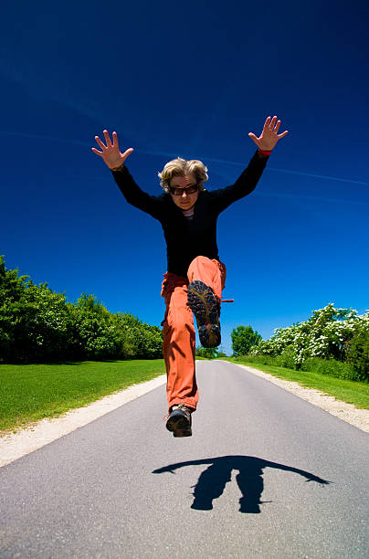 istock Jumping happy girl 118297072