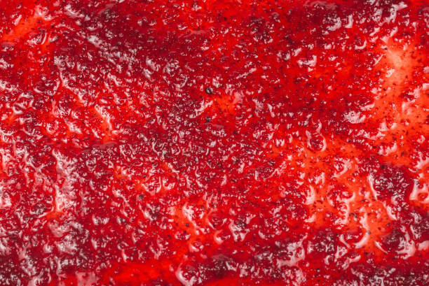 istock Red sweet jam background. Top view. 1182970734