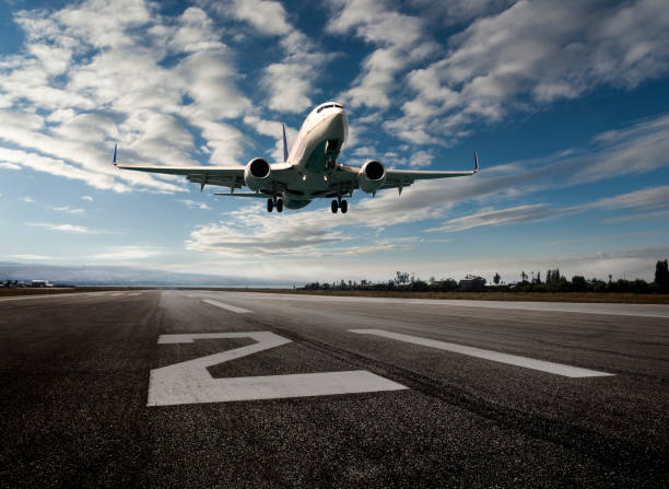 istock Passenger airplane landing 1182972328