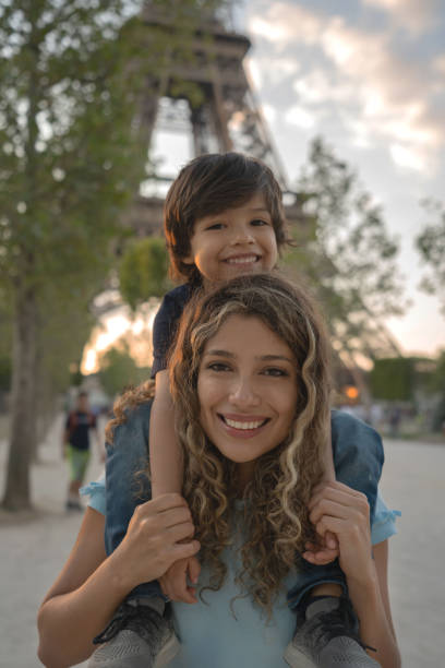 istock Happy mother and son sightseeing in Paris 1182973506