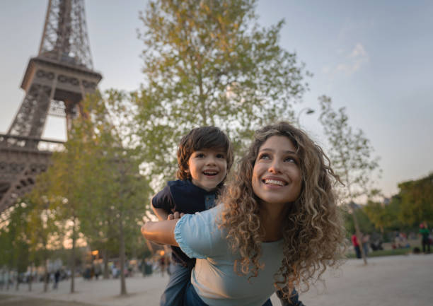 istock Happy tourists in Paris 1182973509