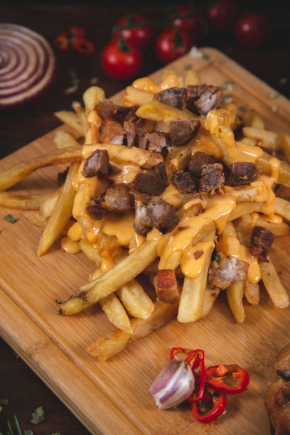 istock Pig's belly and fries 1182974338