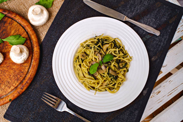 istock Spinach, mushroom and pesto pasta 1182974464