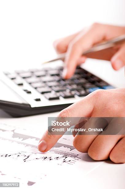 Analyzing Financial Data Stock Photo - Download Image Now - Balance, Ballpoint Pen, Banking