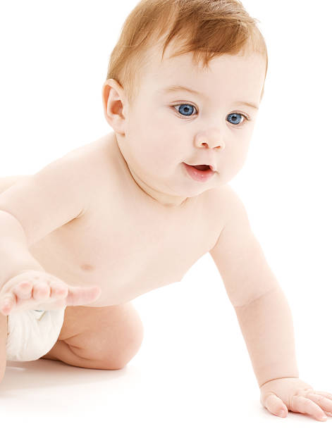 istock crawling baby boy in diaper 118298087