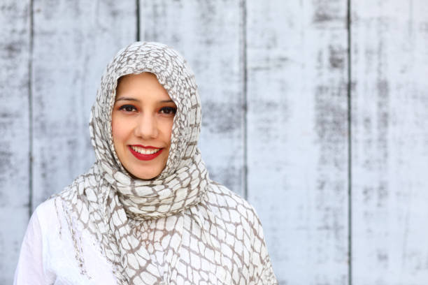istock Middle Eastern Woman Wearing Hijab Smiling Horizontal Left 1182981123