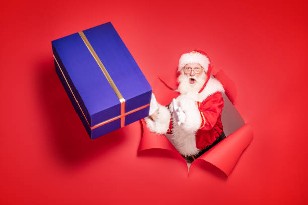 istock Santa Claus with the big gift box. 1182992452