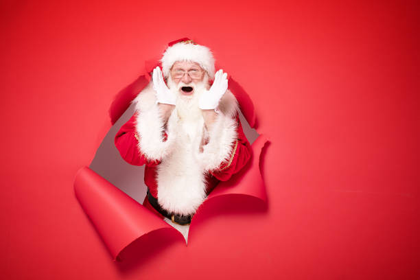 istock Santa Claus on the red background. 1182992605