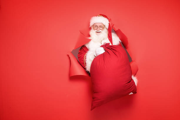큰 선물 상자와 산타 클로스. - santas sack 뉴스 사진 이미지