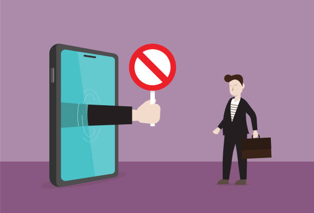 istock Manager show prohibition sign from mobile phone to businessman 1182993545