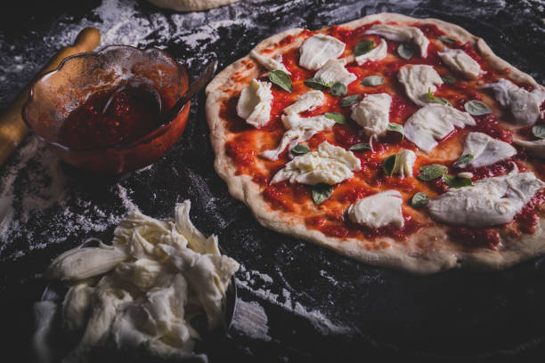 istock Making an Italian pizza at home 1182994906