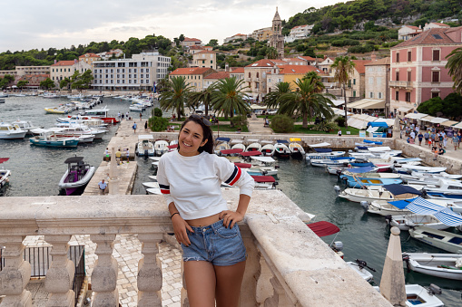 Tourism in Croatia - young adult tourist in Hvar