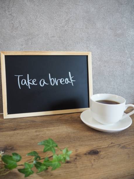 istock White cup and saucer with coffee and black board with 