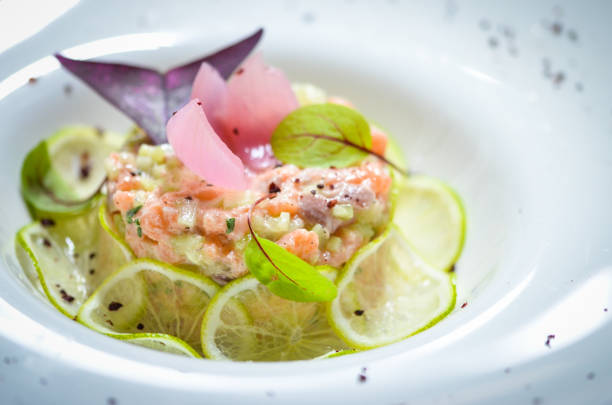istock fresh salmon tartar with lime slices 1182999828