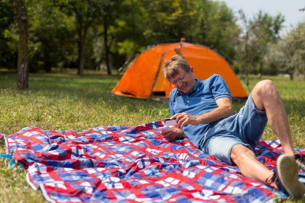 istock Senior man shopping online 1183000729