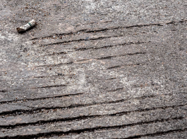 istock The cigarette butt let down on the concrete floor 1183000876