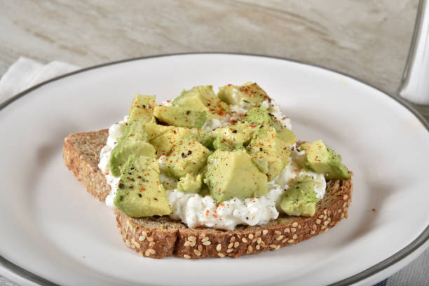 istock Avocado toast with cottage cheese 1183003213