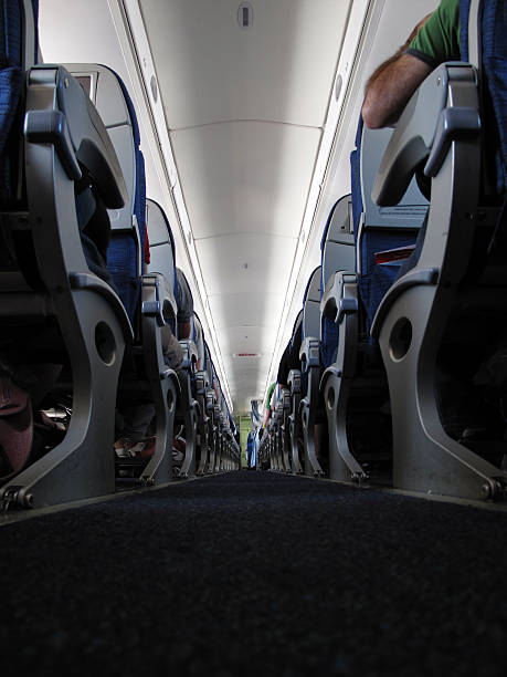 istock Deminishing Perspective Airplane Interior 118300481