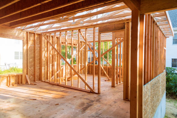 istock Building construction, wood framing new home under construction roof being built 1183006771