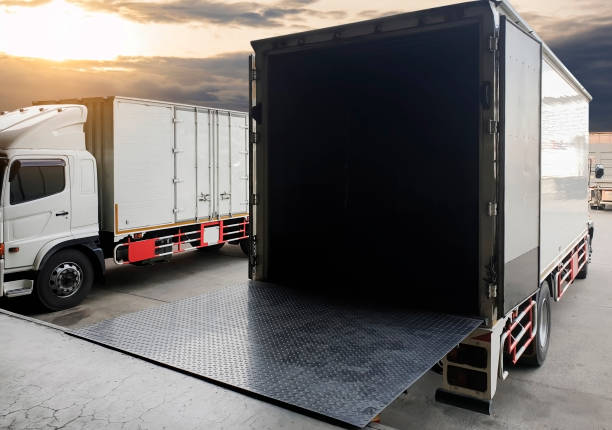 istock The truck container docking load shipment at warehouse 1183011843