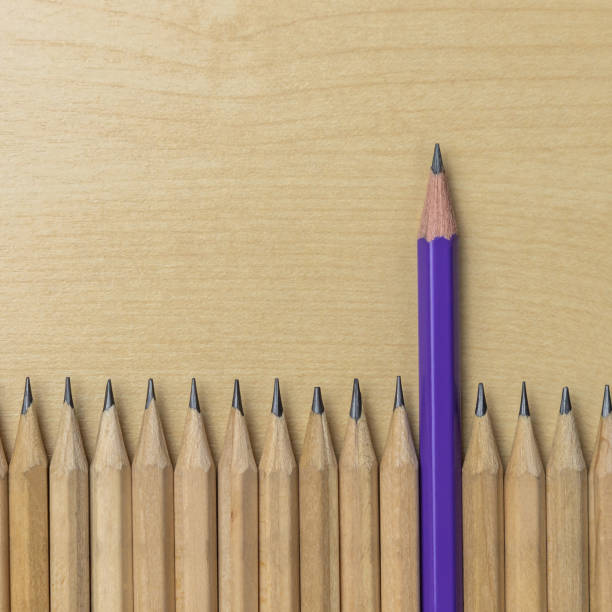 istock Different pencil standout show leadership concept. 1183012475