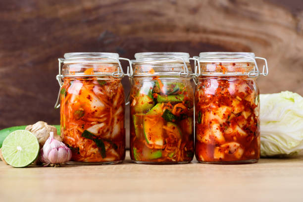 Various kimchi in jar, Korean food stock photo