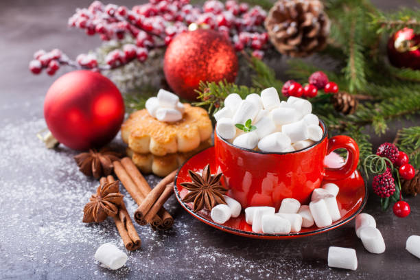 istock cocoa and cookies about marshmallows and Christmas balls on a table, selective focus, copy space 1183020515