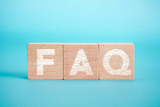 istock Text FAQ With Wooden Block On The Blue Background 1183040030