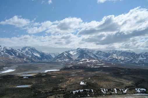 A view of the Toklat River valley with the Alaska Range in the background from the Polychrome pass area of Denali National Park