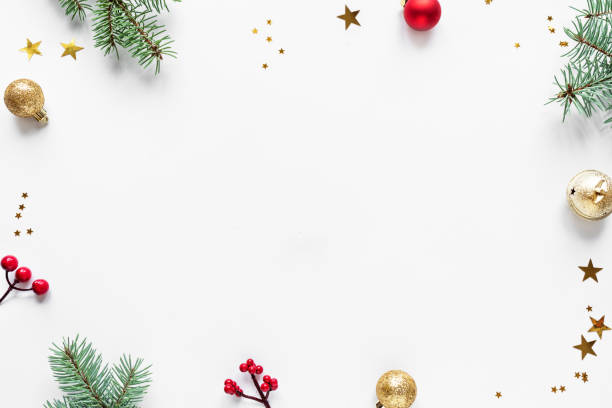 Christmas Background Christmas Background with fir branches, golden and red ornaments and stars, isolated on white background,  copy space. Christmas creative flat lay, concept with festive ornaments. flat lay stock pictures, royalty-free photos & images