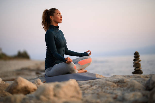 istock Starting her day with Yoga exercises! 1183047157
