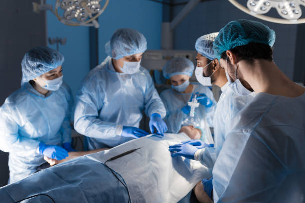 istock Surgeons perform a complex operation to save a human life at hospital 1183048218