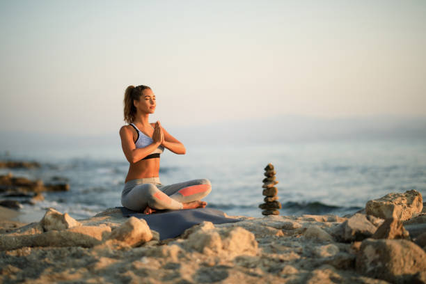 istock Morning meditation by the sea! 1183049413