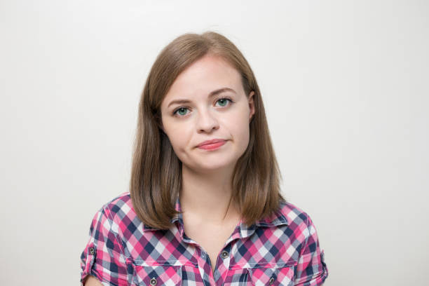 Young caucasian woman girl with confused, annoyed, frustrated, irritated look expression Young caucasian woman girl with confused, annoyed, frustrated, irritated look expression rolling eyes stock pictures, royalty-free photos & images