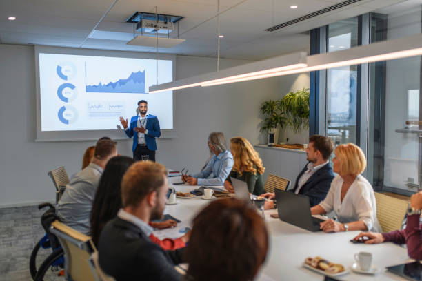istock African Entrepreneur Presenting Ideas to Executive Team 1183053307