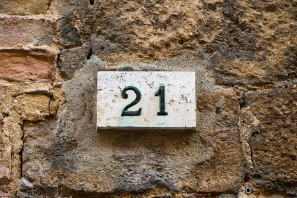 istock Close-Up Of Number 21 On stone wall 1183054803